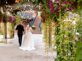 brookside event center bride and groom walking away