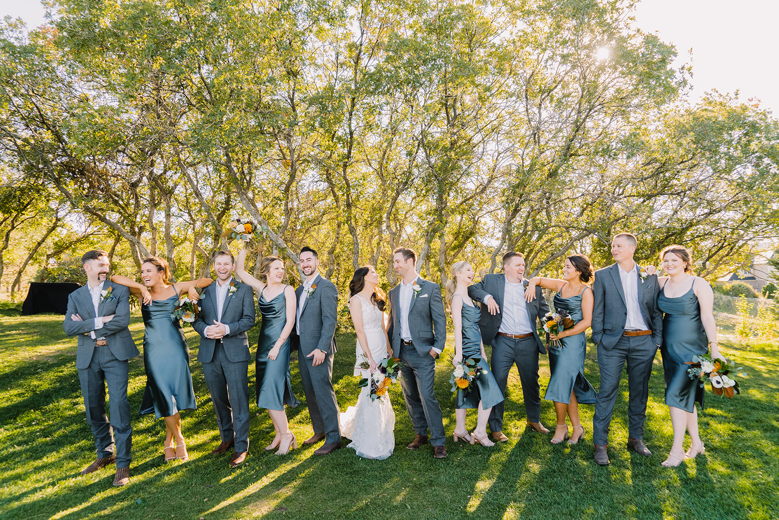 wedding party in fall with golden light