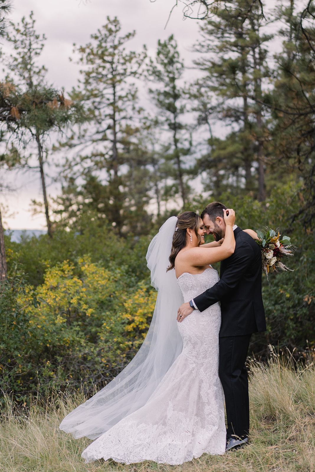 couple photo in woods in fall