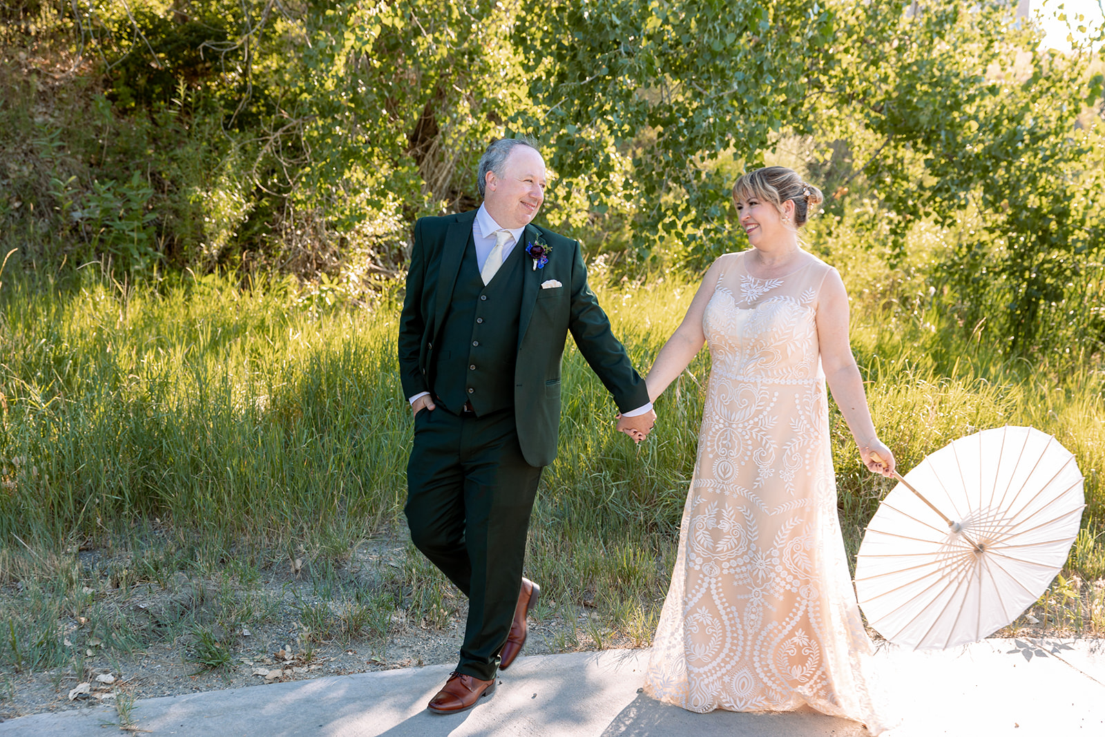 husband and wife portrait with paper parasol