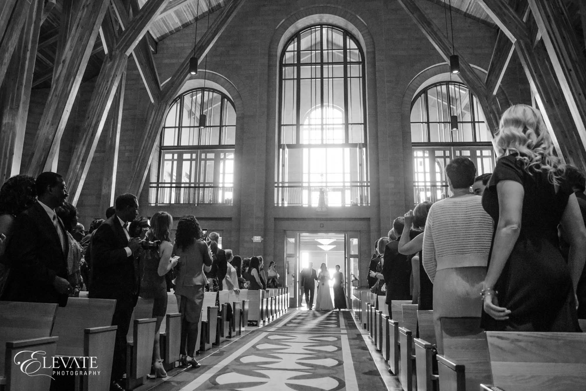 aurora wedding ceremony black and white stained glass