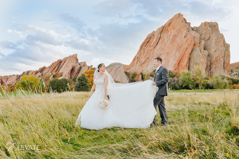 bride and groom in grasses