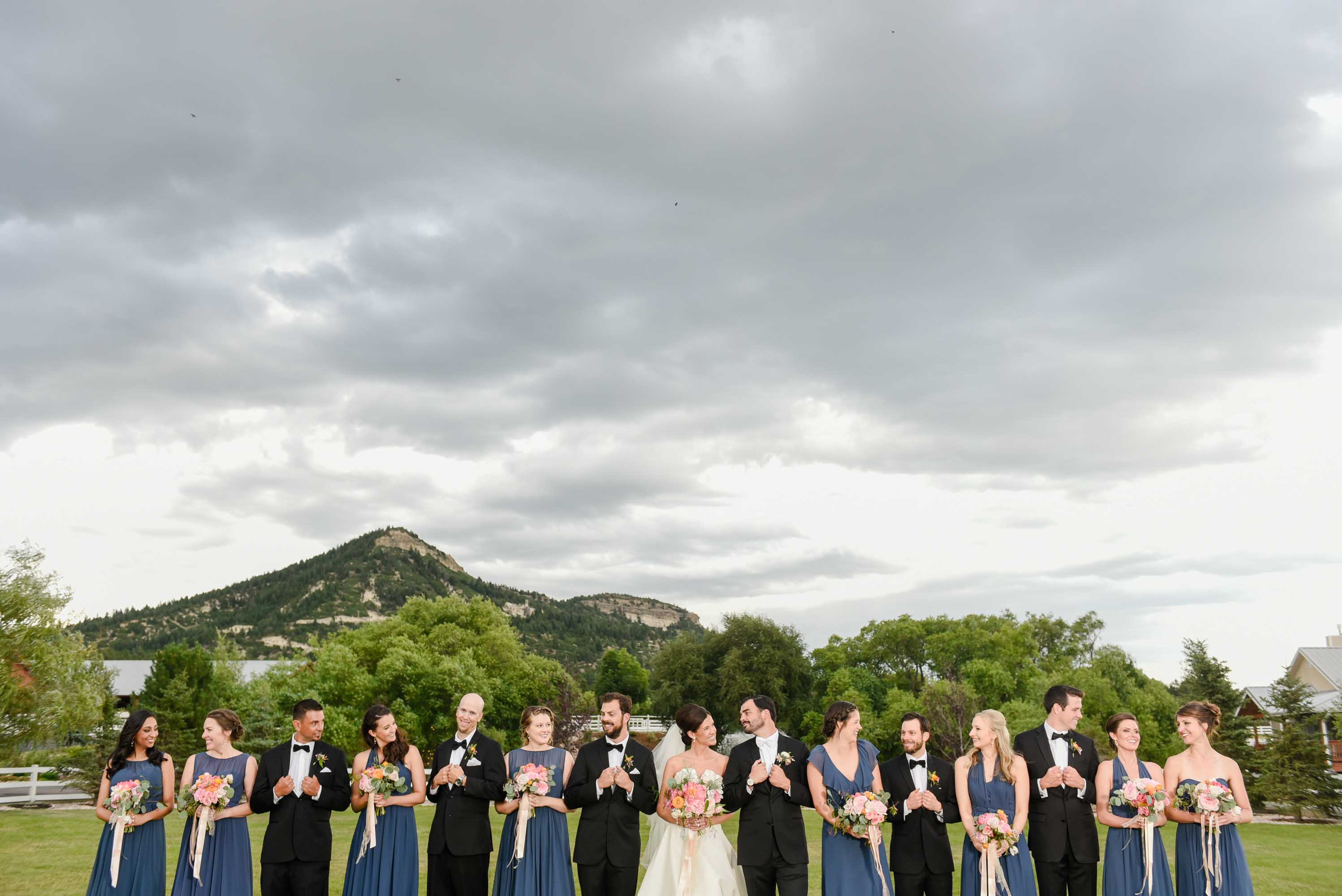 wedding party with mountains