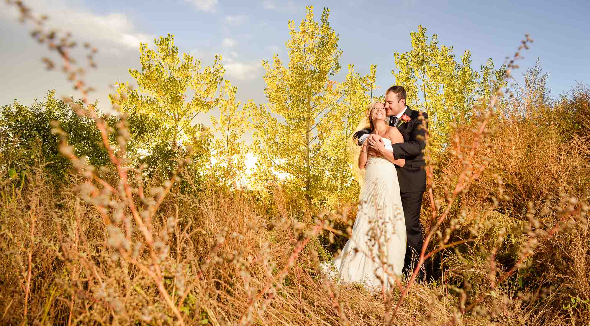 Fall with couple at Wellshire event center