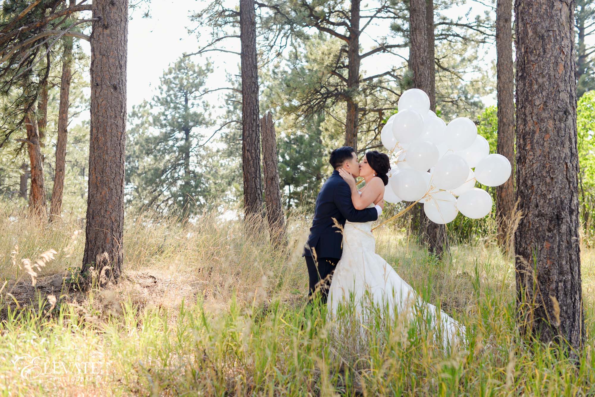 white balloon woods couple