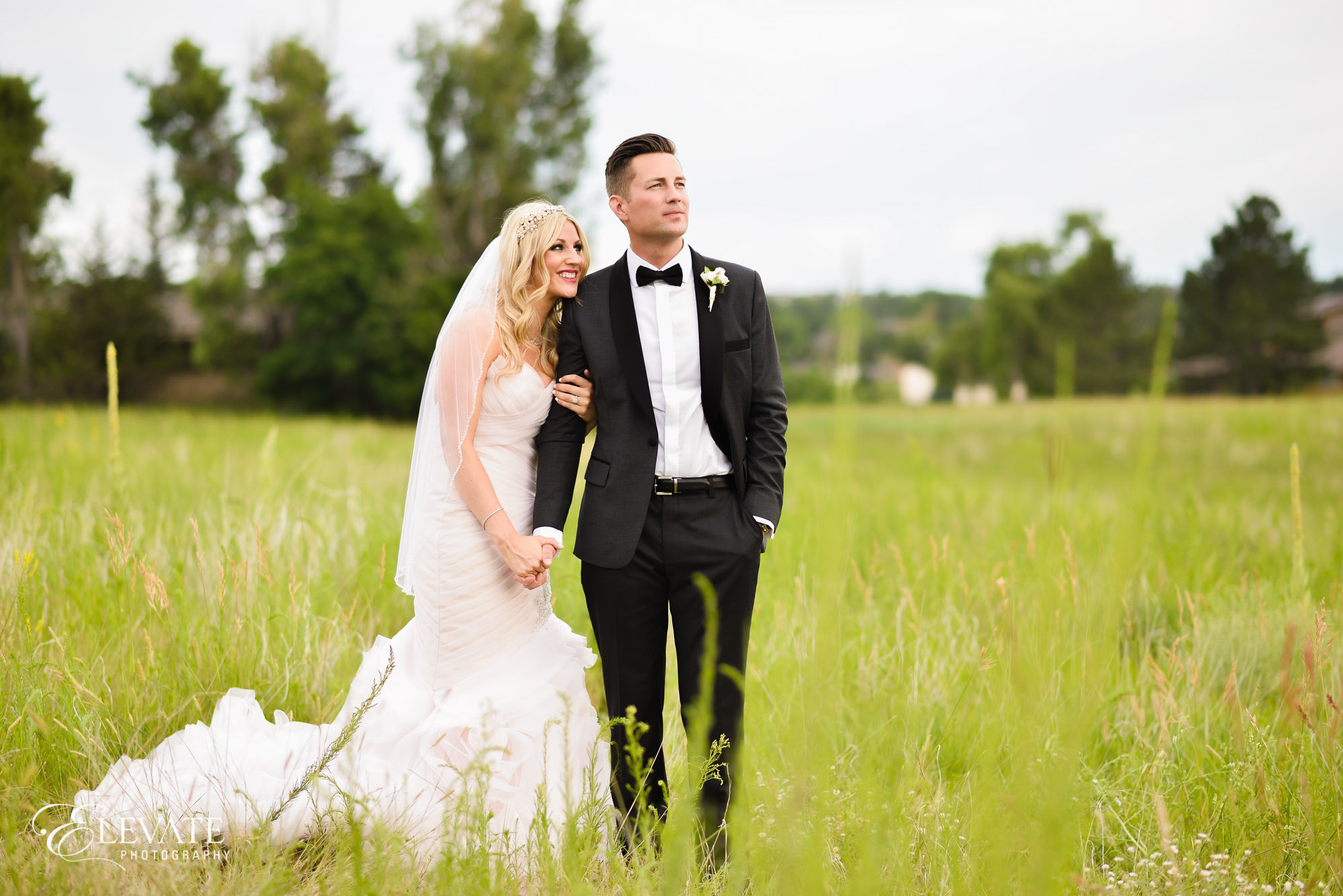 wedding couple in field