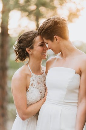 same sex wedding couple white dress suit