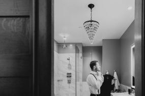 groom getting dressed hotel