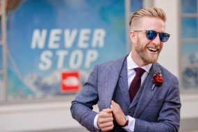 groom glasses blue tweed jacket